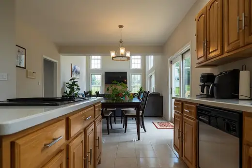 Modern kitchen with island at Women's Sober Living - Severn Home, a sober living home in Maryland.