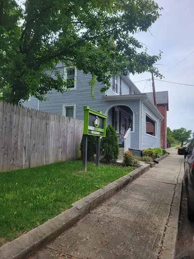 Charming exterior of Humble Beginnings Recovery, a sober living home in Maryland.