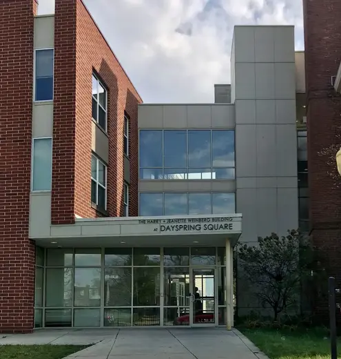 Modern brick exterior of Dayspring Program, a sober living home in Maryland.